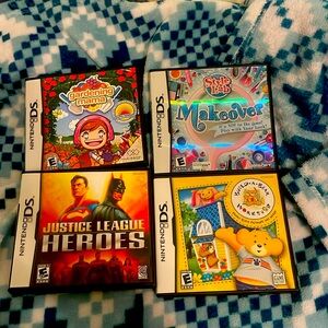 DS games : Gardening mama, Makeover, Justice league heroes,Build a bear workshop